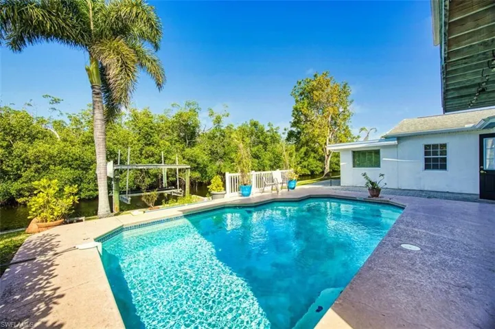 Outdoor pool featuring a patio