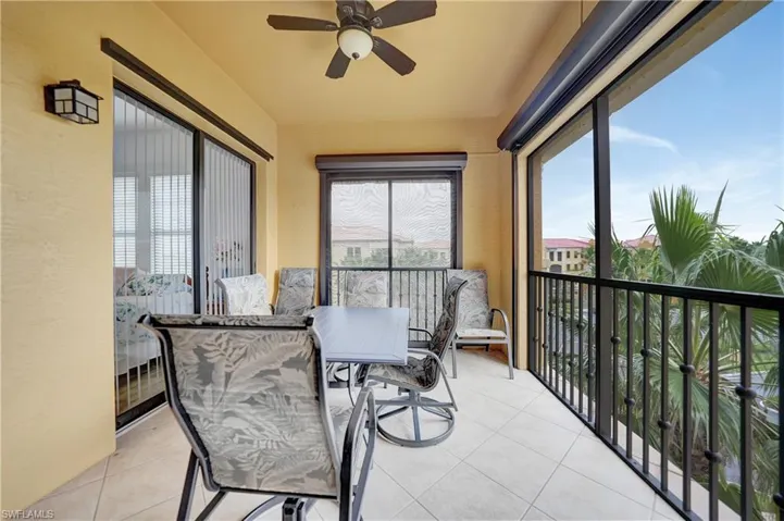 Sunroom featuring tile patterned flooring