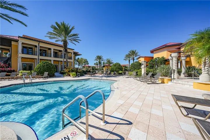 Community pool with a patio area