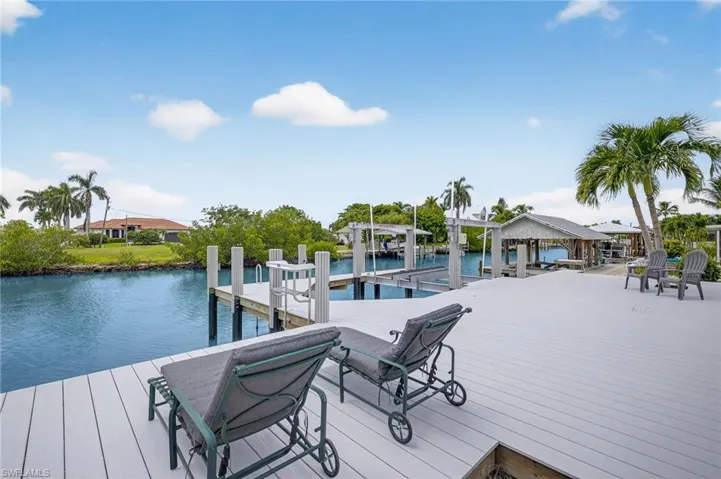 Dock with a water view and boat lift