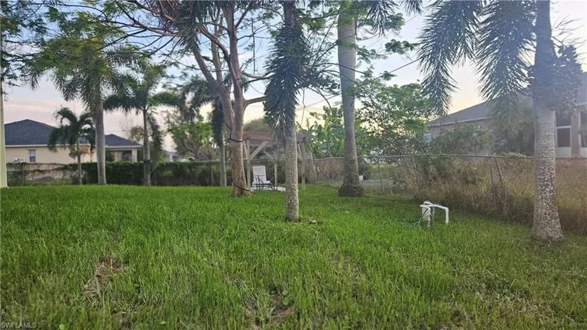 View of yard at dusk