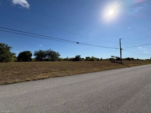 View of asphalt street with a view of countryside