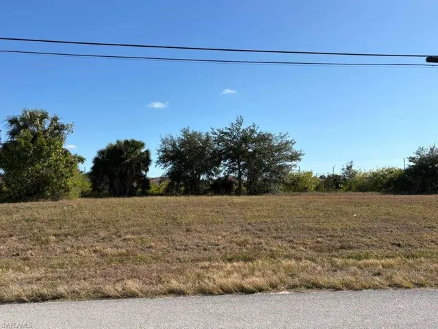 View of asphalt road featuring a rural view