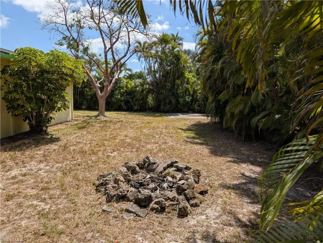 View of yard with fire pit