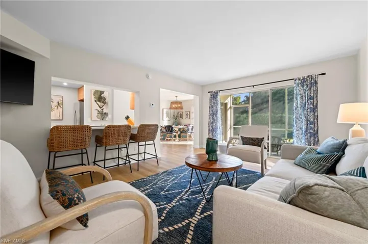 Living area with wood finished floors