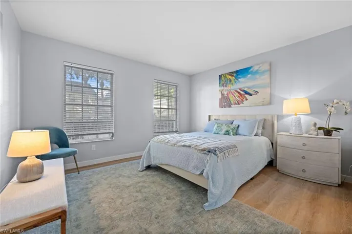 Bedroom with wood finished floors