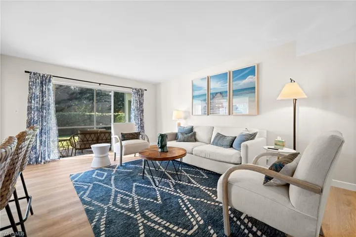 Living room featuring light wood-style floors