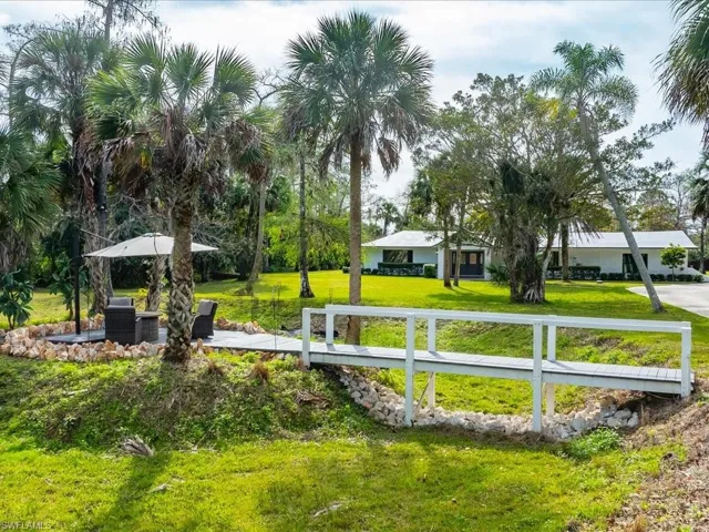 Front yard features a private sitting area