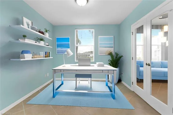 Office featuring french doors and light tile floors
