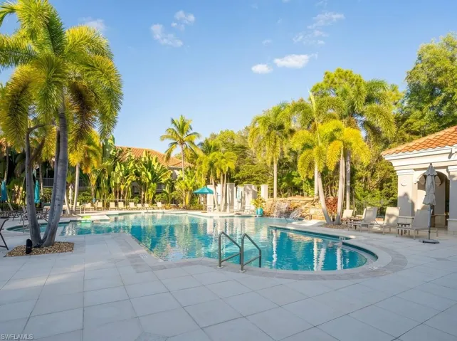 Community pool with a patio area