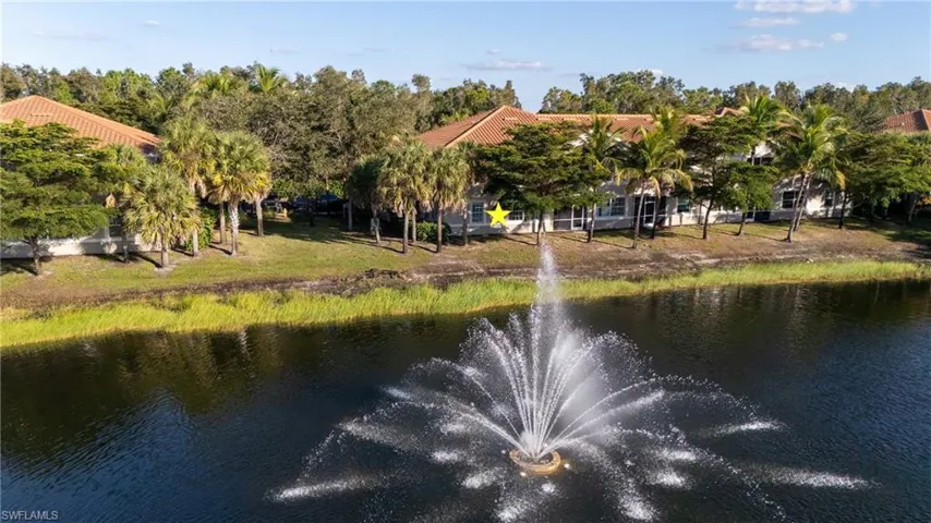 Water view with a tree filled landscape