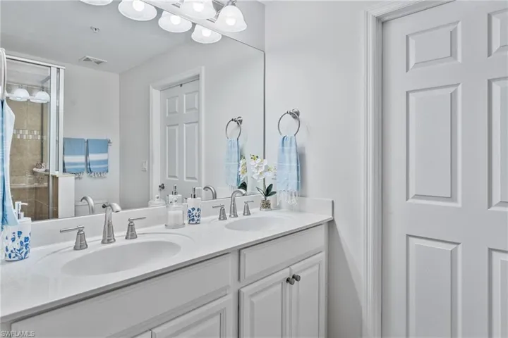 Bathroom featuring double vanity