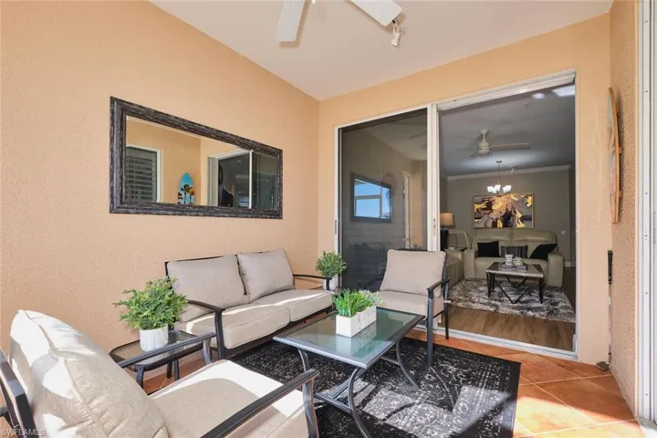 View of patio / terrace with an outdoor hangout area and a ceiling fan