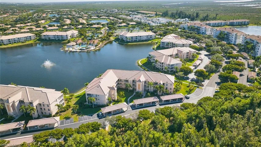 Bird's eye view of apartment complex / building and a large body of water