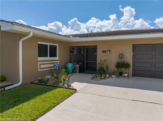 Front entrance to home and screened in front porch!