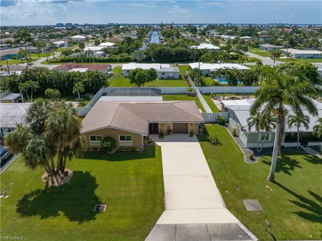 Front of home looking South towards Yacht Club