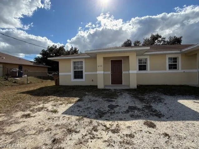View of front of property with stucco siding