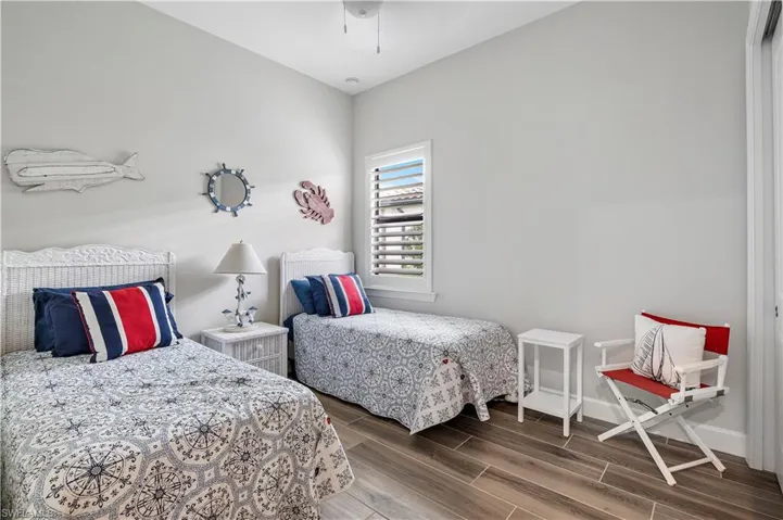 Bedroom with wood-type flooring