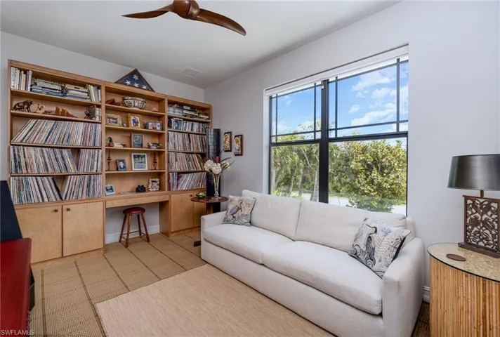 Spacious den with preserve views