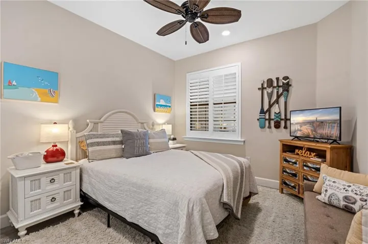 Bedroom featuring ceiling fan