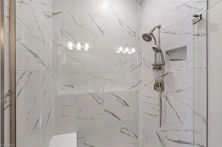 Bathroom with a tile shower