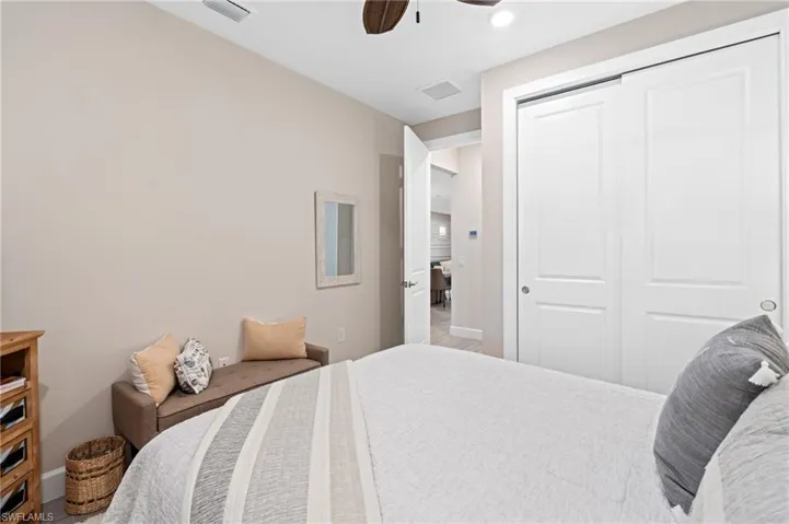 Bedroom with a closet and ceiling fan