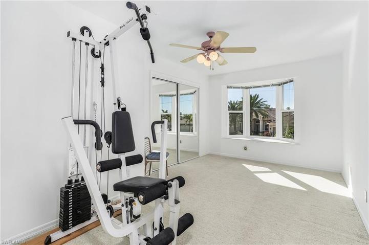 Bedroom #5 upstairs with large closet and impact resistent bay window (currently the exercise room)