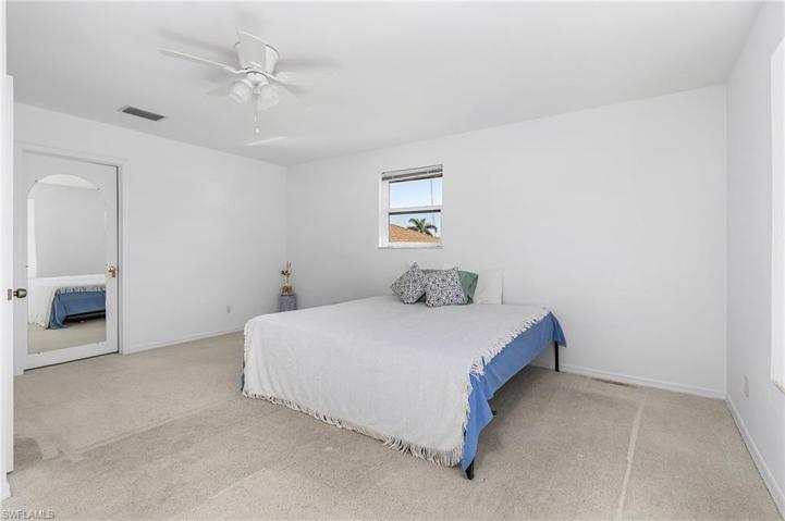 Bedroom #4 upstairs with huge walk in closet and all impact windows & bay window and walk in to attic space