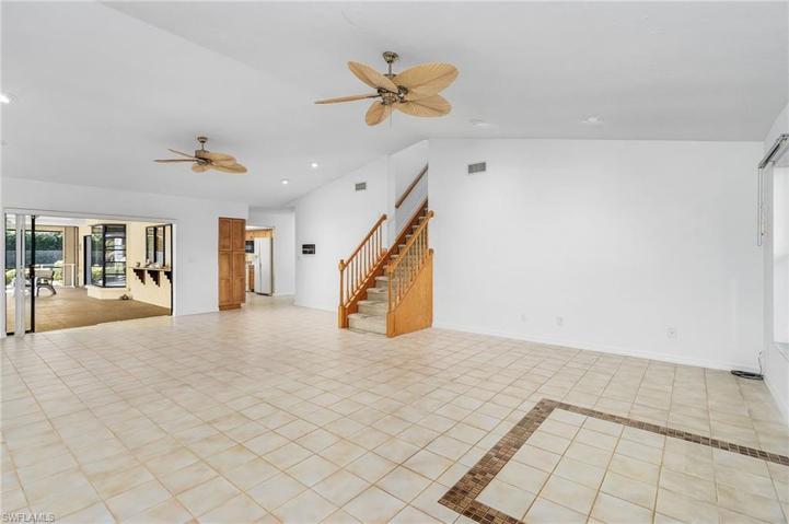 Huge great room with impact windows and pocket sliders to join the lanai