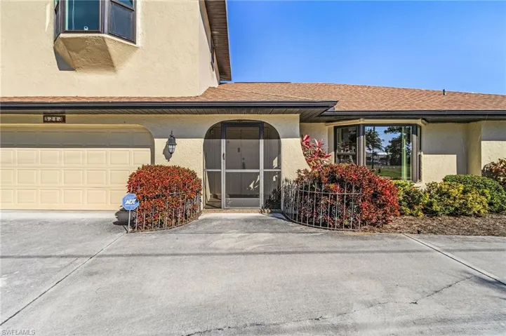 Screened front entry allows the double doors to open for Florida weather during the winter and spring