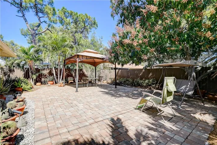 The outdoor space makes this home truly unique.  Fruit trees, plenty of shade and sun - this truly is paradise in Bonita Springs!