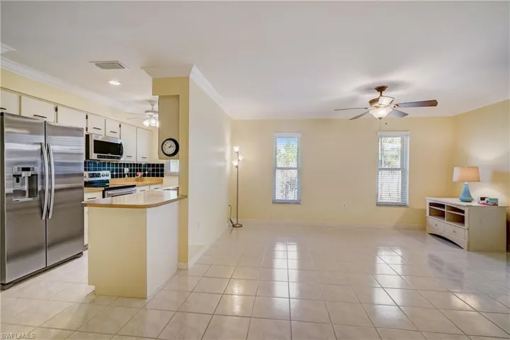Open living, kitchen and dining area in this charming "beachy" home in Bonita Springs!