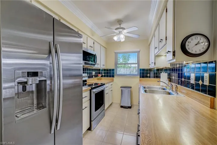 Galley kitchen with plenty of prep space.