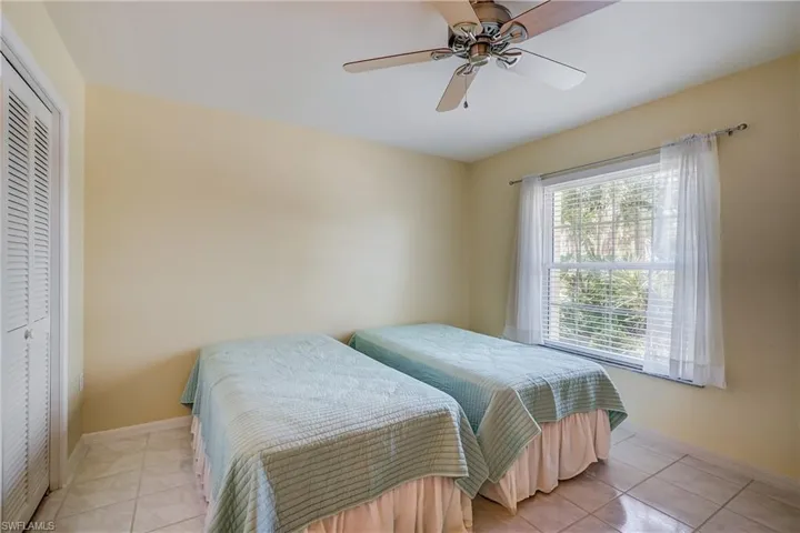 Guest bedrooms are in the front of the home, away from the primary suite.