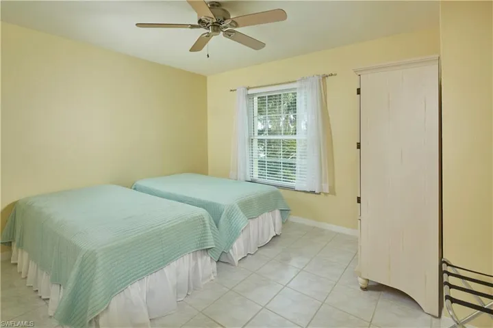 Guest bedrooms are in the front of the home, away from the primary suite.