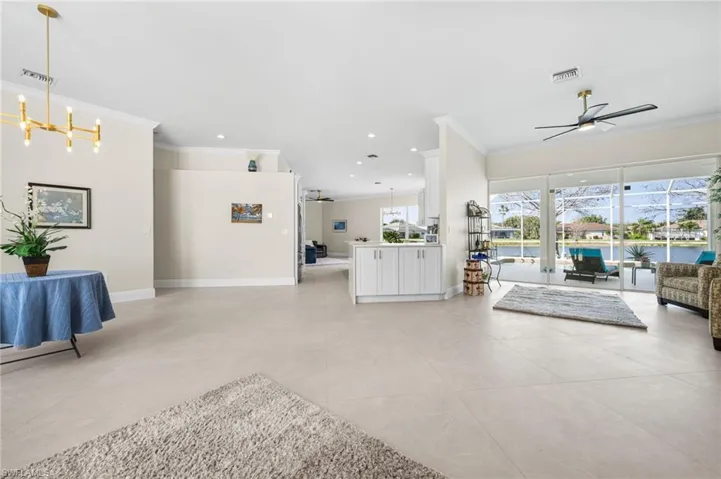 Designer tiled thought-out, waterfall quartz countertops, crown moldings, new 6 inch base and designer showcase paint