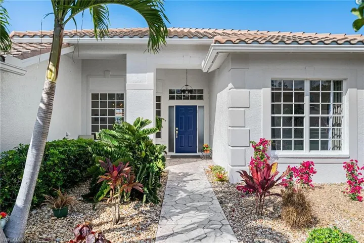 colorful easy care landscaping of entrance to property