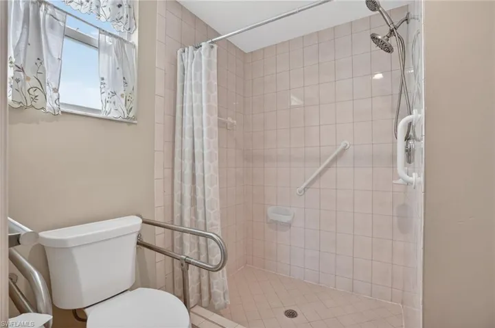 Bathroom featuring a shower stall