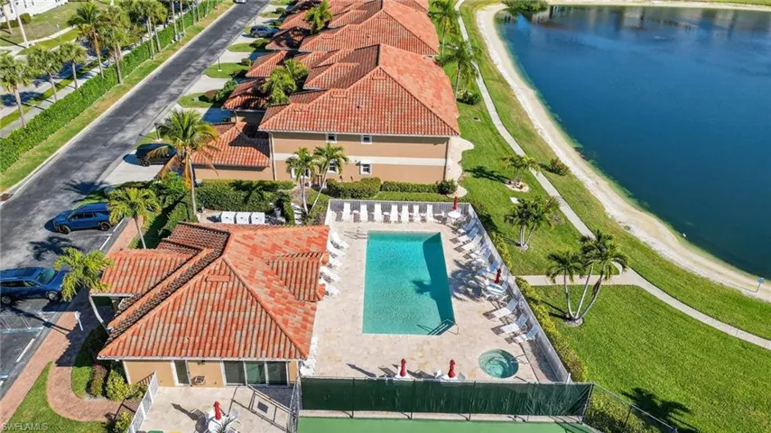 Bird's eye view of a large body of water and a pool area