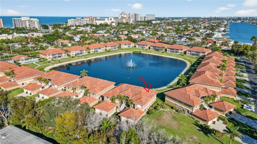 Aerial overview of property's location featuring a nearby body of water