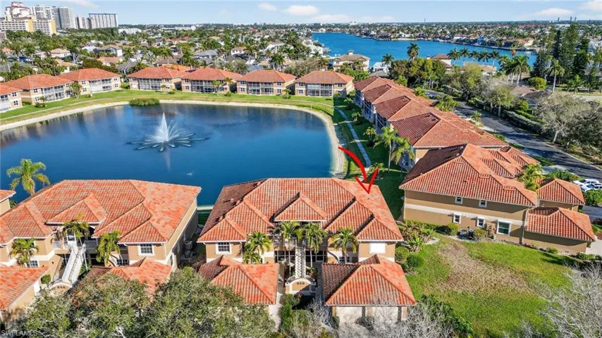 Aerial view of residential area with a nearby body of water