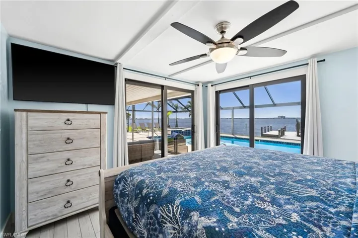 Bedroom 2 has dual Sliding Doors to the Lanai and Pool