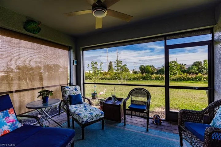 Screened Patio w/ceiling fan, Manual Sun Shade and Electric Roll Down Shutters