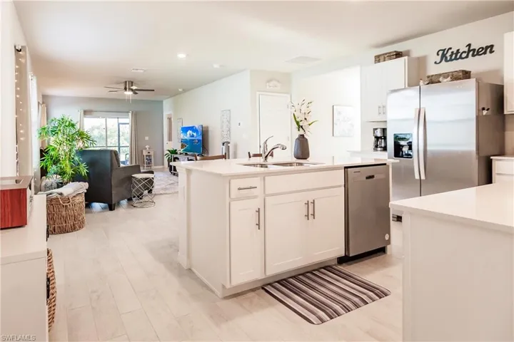Kitchen featuring a center island sink