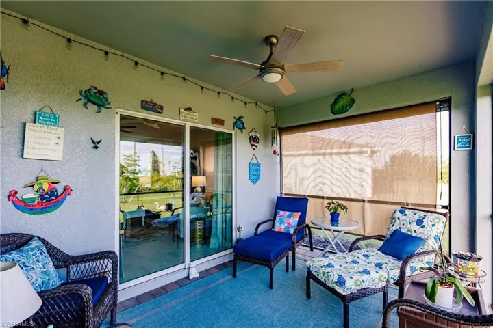 Screened Patio w/ceiling fan, Manual Sun Shade and Electric Roll Down Shutters