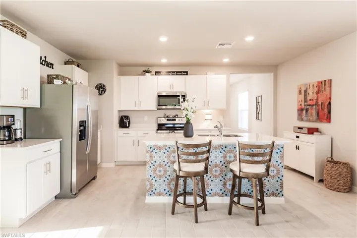 Kitchen with stainless steel finish appliances