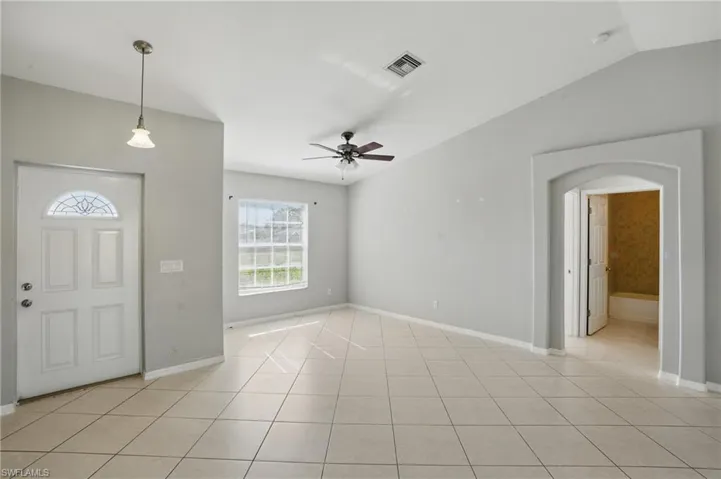 Entryway, den and living room