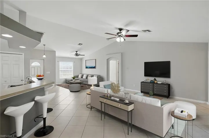 Virtually staged living room and den