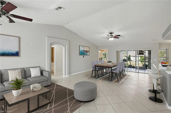 Virtually staged living room and den