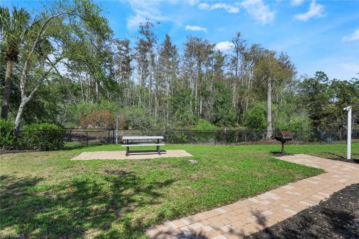 Picnic/Grill Area connected just outside the Community Pool